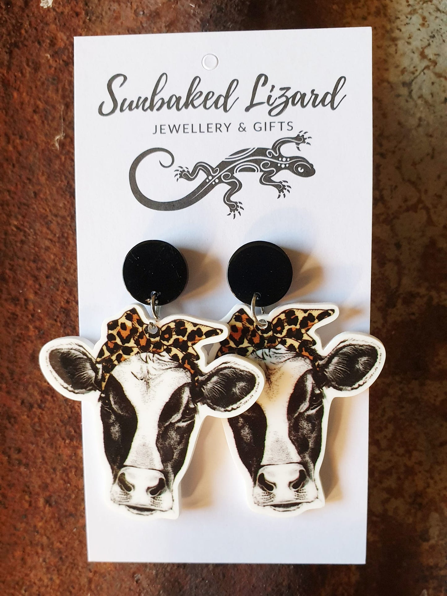 Large Dairy Cow Wearing Bow Stud Drops