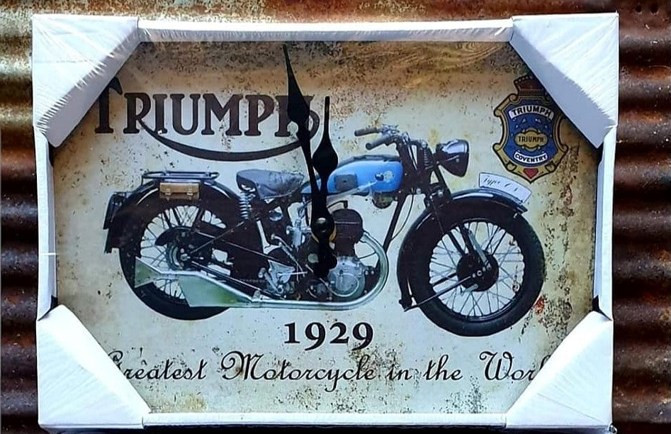 Triumph Clock